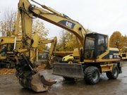Колесный экскаватор CATERPILLAR M315