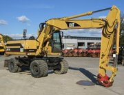 Колесный экскаватор CATERPILLAR M318