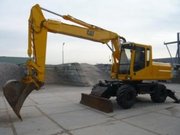 Колесный экскаватор CATERPILLAR M31