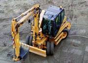 Колесный экскаватор CASE