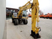 New Holland MH City  колесный экскаватор