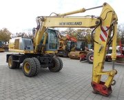 NEW HOLLAND MH5.6-колесный экскаватор