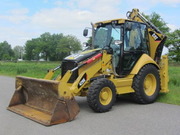 Caterpillar 428 E-экскаватор-погрузчи
